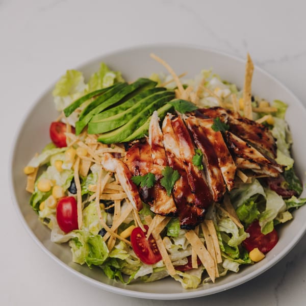 Braxton's Kitchen BBQ chicken salad with avocado, corn, tomatoes, and tortilla strips.